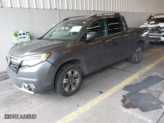 2017 Honda Ridgeline RTL-E with VIN 5FPYK3F73HB034764, listed as a IAAI auction lot 41146866 with 125,885 mi miles. Bid and sale history available at carsss.com. Image 17.