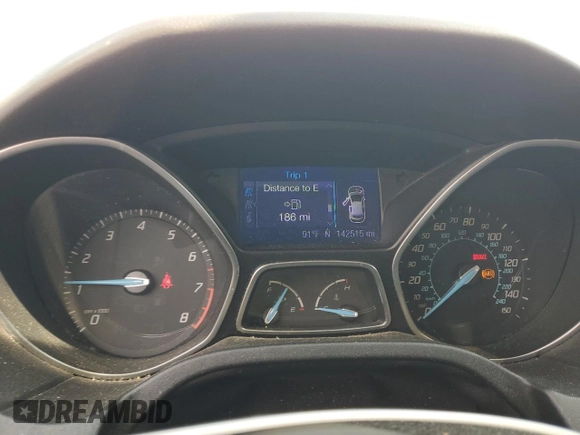 2012 Ford Focus SE with VIN 1FAHP3F21CL445400, listed as a Copart auction lot 58512535 with 142,515 mi miles and Salvage title. Bid and sale history available at DreamBid. Image 9.