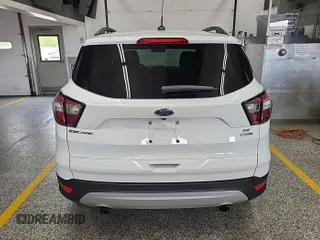 2018 Ford Escape SE z VIN 1FMCU9GD3JUC89119, wystawiony jako IAAI lot #42421139 z przebiegiem 42 209 mil mil oraz . Historia ofert i sprzedaży dostępna na DreamBid. Obrazek 20.