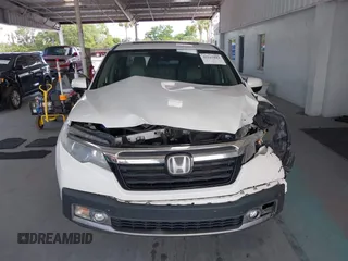 2020 Honda Ridgeline RTL-E with VIN 5FPYK3F71LB005028, listed as a IAAI auction lot 42167883 with 81,882 mi miles and . Bid and sale history available at DreamBid. Image 12.