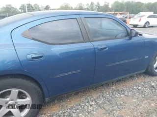 2009 Dodge Charger SXT with VIN 2B3KA33V39H585083, listed as a IAAI auction lot 41911176 with 134,600 mi miles and . Bid and sale history available at carsss.com. Image 14.