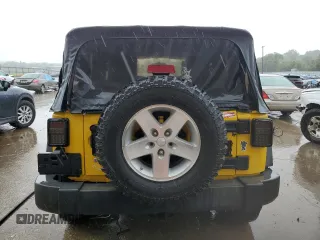 2009 Jeep Wrangler X с VIN 1J4FA24169L775219, выставлен на аукционе Copart как лот 71110304 с пробегом 132 886 миль миль и Списание • Salvage title. История ставок и продаж доступна на DreamBid. Изображение 6.