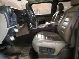 2006 Hummer H2 with VIN 5GRGN23U06H111389, listed as a Copart auction lot 88747715 with 182,628 mi miles and Salvage Title. Bid and sale history available at carsss.com. Image 7.