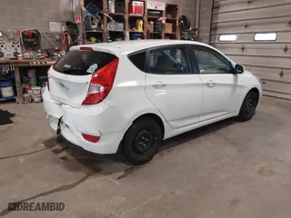 2013 Hyundai Accent GL with VIN KMHCT5AE1DU088241, listed as a IAAI auction lot 41909194 with 87,622 mi miles. Bid and sale history available at carsss.com. Image 4.