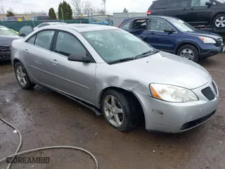 2006 Pontiac G6 6-Cyl with VIN 1G2ZG558464289212, listed as a IAAI auction lot 41994843 with 126,502 mi miles. Bid and sale history available at carsss.com. Image 1.