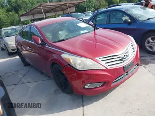 2013 Hyundai Azera with VIN KMHFG4JG4DA253875, listed as a IAAI auction lot 42773889 with 188,528 mi miles and . Bid and sale history available at DreamBid. Image 1.