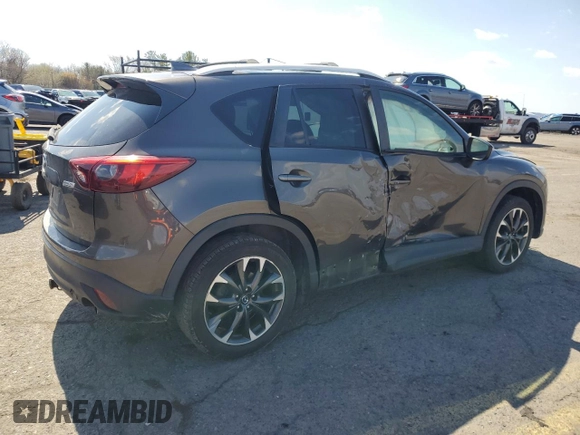 2016 Mazda CX-5 Grand Touring with VIN JM3KE4DY1G0806674, listed as a Copart auction lot 50549465 with 139,753 mi miles and Salvage Title. Bid and sale history available at carsss.com. Image 3.