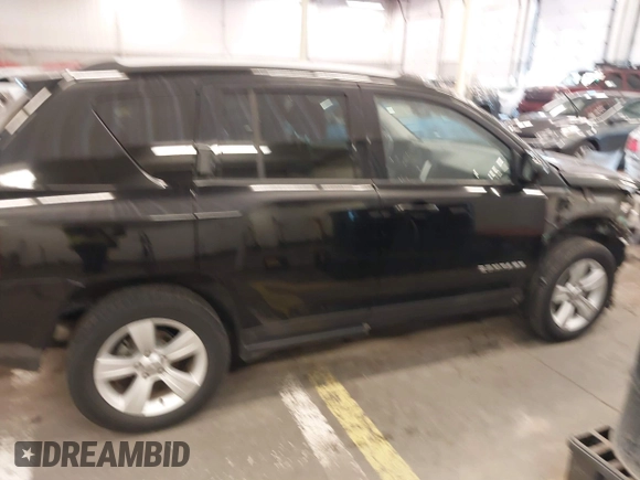 2017 Jeep Compass Latitude with VIN 1C4NJDEB1HD125176, listed as a IAAI auction lot 41321936 with 71,822 mi miles and . Bid and sale history available at DreamBid. Image 14.