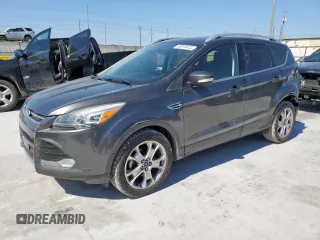 2015 Ford Escape Titanium with VIN 1FMCU0JX2FUA08580, listed as a Copart auction lot 65919445 with 121,530 mi miles and Clean title. Bid and sale history available at DreamBid. Image 1.
