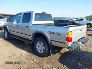 2001 Toyota Tacoma PreRunner z VIN 5TEGN92N41Z768370, wystawiony jako IAAI lot #42228571 z przebiegiem 172 317 mil mil oraz . Historia ofert i sprzedaży dostępna na DreamBid. Obrazek 3.