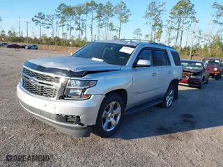 2017 Chevrolet Tahoe LS with VIN 1GNSCAKC6HR161464, listed as a IAAI auction lot 41440911 with 174,662 mi miles. Bid and sale history available at carsss.com. Image 2.