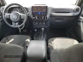 2016 Jeep Wrangler Unlimited Sport with VIN 1C4BJWDG7GL292531, listed as a Copart auction lot 54062075 with 110,878 mi miles and Salvage Title. Bid and sale history available at DreamBid. Image 8.