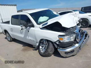 2020 Ram 1500 Lone Star with VIN 1C6RREFT6LN100386, listed as a IAAI auction lot 42087691 with 107,559 mi miles and . Bid and sale history available at DreamBid. Image 1.
