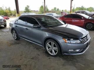 2015 Volkswagen Passat 1.8T Sport with VIN 1VWBT7A35FC009590, listed as a Copart auction lot 69564634 with 61,959 mi miles and Salvage Title. Bid and sale history available at carsss.com. Image 4.
