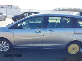2013 Mazda 5 Sport with VIN JM1CW2BL6D0146696, listed as a IAAI auction lot 41657255 with 142,939 mi miles and . Bid and sale history available at DreamBid. Image 15.