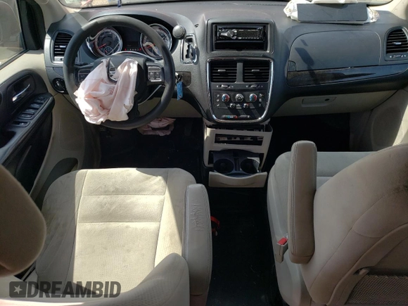 2015 Dodge Grand Caravan SE with VIN 2C4RDGBG2FR613184, listed as a Copart auction lot 67111284 with 249,959 mi miles and Salvage Title. Bid and sale history available at DreamBid. Image 8.