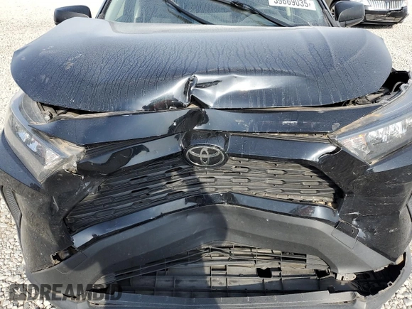 2019 Toyota RAV4 LE with VIN JTMH1RFV8KD039728, listed as a Copart auction lot 59669035 with 100,355 mi miles and Salvage title. Bid and sale history available at DreamBid. Image 12.