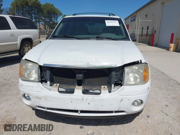 2007 GMC Envoy SLE with VIN 1GKDT13S472223365, listed as a IAAI auction lot 41690531 with 170,539 mi miles. Bid and sale history available at carsss.com. Image 6.