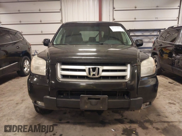 2007 Honda Pilot EX-L with VIN 5FNYF18677B017230, listed as a IAAI auction lot 41727853 with 257,527 mi miles and . Bid and sale history available at DreamBid. Image 13.