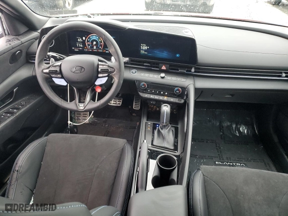 2025 Hyundai Elantra N with VIN KMHLW4DK7SU024981, listed as a Copart auction lot 44024035 with 584 mi miles and Salvage Title. Bid and sale history available at carsss.com. Image 8.