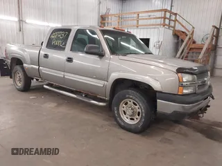 2003 Chevrolet Silverado 1500HD LS z VIN 1GCGK13U43F215122, wystawiony jako IAAI lot #42277237 z przebiegiem Nie podano mil oraz . Historia ofert i sprzedaży dostępna na DreamBid. Obrazek 1.