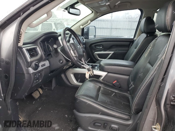 2018 Nissan Titan Pro-4X z VIN 1N6AA1E51JN536680, wystawiony jako Copart lot #82361724 z przebiegiem 98 699 mil mil oraz Szkoda całkowita • Salvage title. Historia ofert i sprzedaży dostępna na DreamBid. Obrazek 7.
