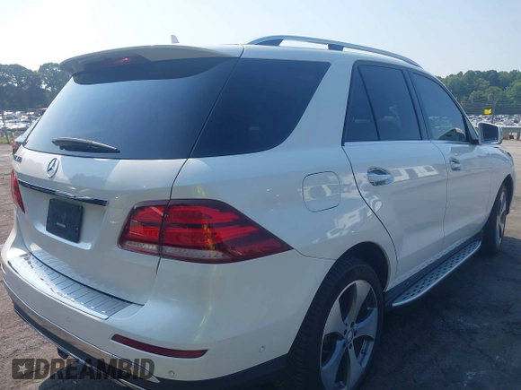 2016 Mercedes-Benz GLE 350 z VIN 4JGDA5JB9GA763209, wystawiony jako IAAI lot #42605541 z przebiegiem 75 461 mil mil oraz . Historia ofert i sprzedaży dostępna na DreamBid. Obrazek 4.