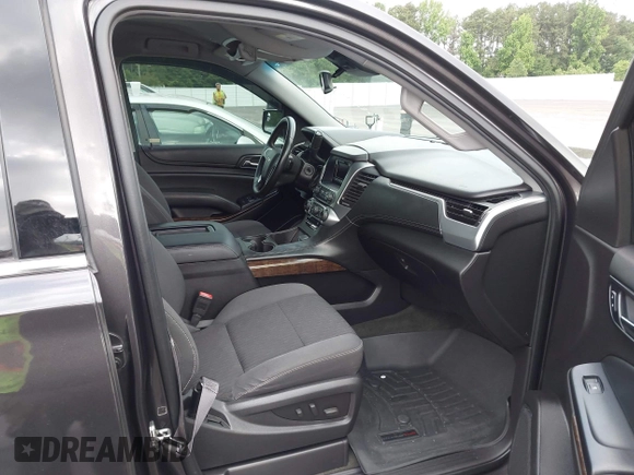 2015 Chevrolet Tahoe LS with VIN 1GNSCAKC0FR245826, listed as a IAAI auction lot 42282590 with 164,208 mi miles and . Bid and sale history available at DreamBid. Image 5.