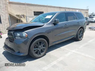 2013 Dodge Durango SXT with VIN 1C4RDHAG3DC694256, listed as a IAAI auction lot 42431904 with 152,321 mi miles and . Bid and sale history available at DreamBid. Image 2.