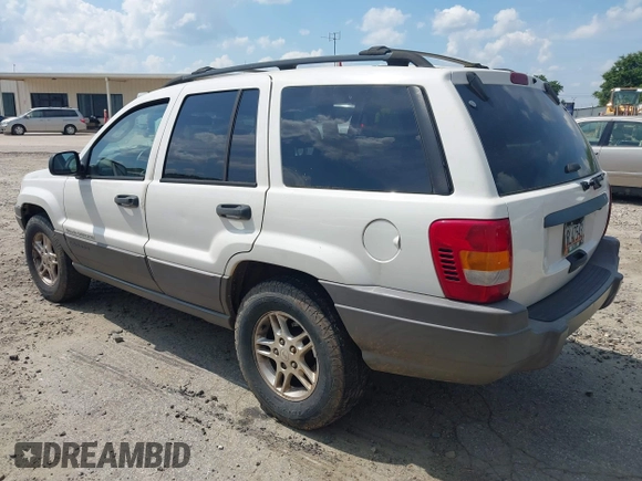 2003 Jeep Grand Cherokee Laredo z VIN 1J4GX48S33C519404, wystawiony jako IAAI lot #42164364 z przebiegiem 174 627 mil mil oraz . Historia ofert i sprzedaży dostępna na DreamBid. Obrazek 3.