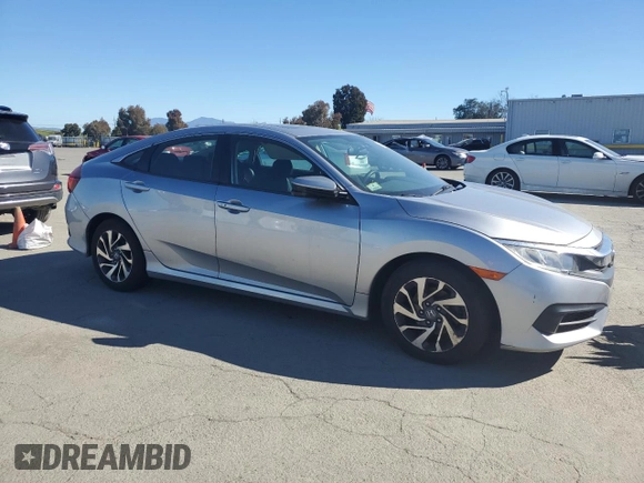 2018 Honda Civic EX with VIN 19XFC2F79JE201759, listed as a Copart auction lot 50547075 with 64,217 mi miles and Clean Title. Bid and sale history available at DreamBid. Image 4.