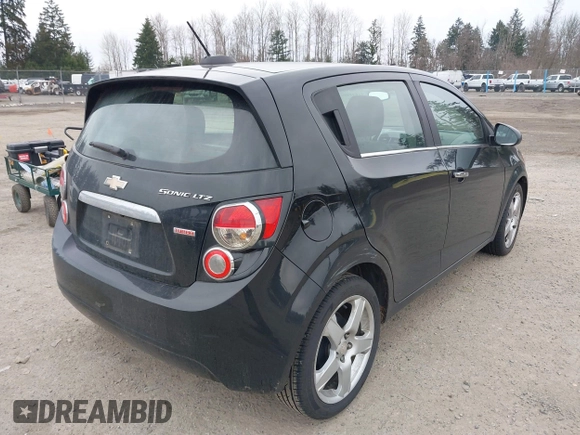 2016 Chevrolet Sonic LTZ z VIN 1G1JE6SB3G4149439, wystawiony jako IAAI lot #41648101 z przebiegiem 114 902 mil mil oraz . Historia ofert i sprzedaży dostępna na DreamBid. Obrazek 4.