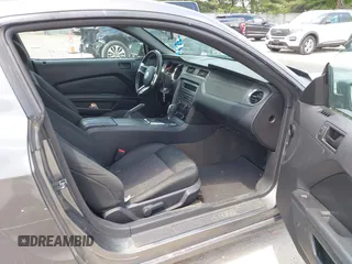 2013 Ford Mustang V6 with VIN 1ZVBP8AM0D5260795, listed as a IAAI auction lot 42222754 with 98,322 mi miles and . Bid and sale history available at carsss.com. Image 5.