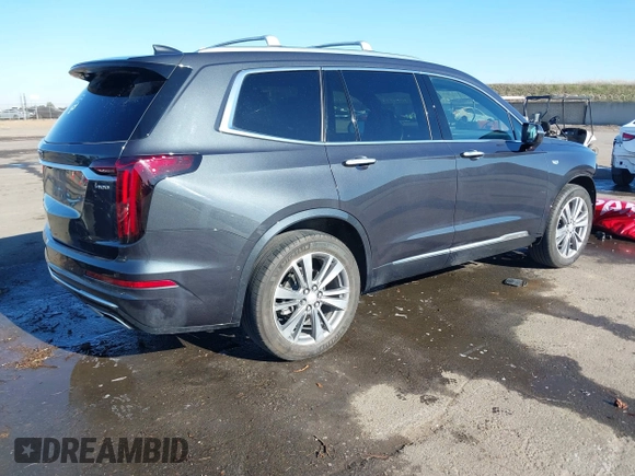 2022 Cadillac XT6 Premium Luxury with VIN 1GYKPFRS7NZ173703, listed as a IAAI auction lot 41335618 with 32,116 mi miles. Bid and sale history available at carsss.com. Image 4.