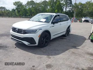2024 Volkswagen Tiguan SE R-Line Black with VIN 3VVCB7AX6RM093792, listed as a IAAI auction lot 42117670 with 15,379 mi miles and . Bid and sale history available at DreamBid. Image 16.