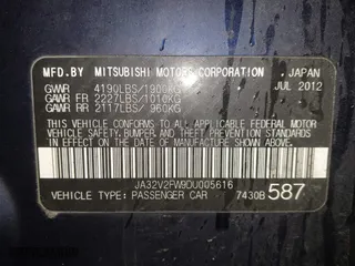 2013 Mitsubishi Lancer SE with VIN JA32V2FW9DU005616, listed as a IAAI auction lot 41247087 with 129,055 mi miles. Bid and sale history available at carsss.com. Image 9.
