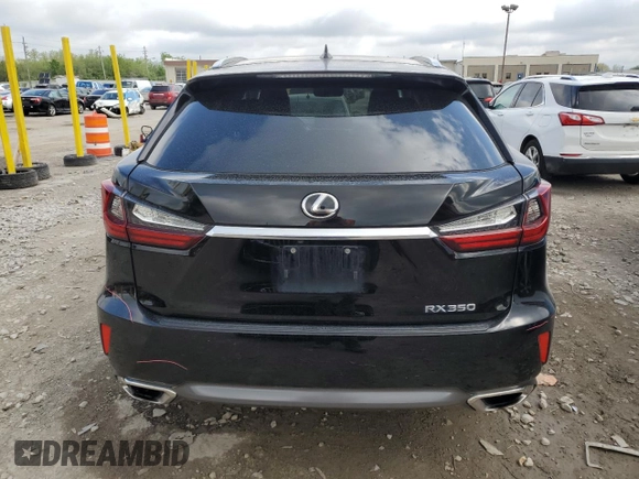 2019 Lexus RX 350 z VIN 2T2BZMCA2KC187613, wystawiony jako Copart lot #55376685 z przebiegiem 74 960 mil mil oraz Szkoda całkowita • Salvage title. Historia ofert i sprzedaży dostępna na DreamBid. Obrazek 6.