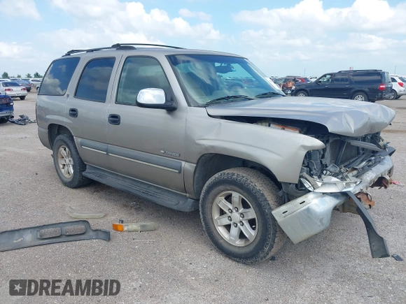 2002 Chevrolet Tahoe LS z VIN 1GNEC13V22R206341, wystawiony jako IAAI lot #42436560 z przebiegiem 271 904 mil mil oraz . Historia ofert i sprzedaży dostępna na DreamBid. Obrazek 1.