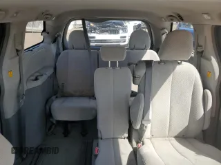 2012 Toyota Sienna LE AAS with VIN 5TDKK3DC7CS195590, listed as a Copart auction lot 57968415 with 201,732 mi miles and Salvage title. Bid and sale history available at DreamBid. Image 10.