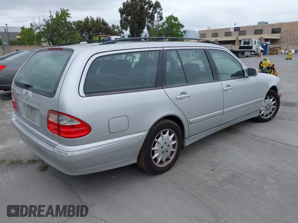 2002 Mercedes-Benz E 320 with VIN WDBJH65JX2B408254, listed as a IAAI auction lot 42131380 with 173,786 mi miles and . Bid and sale history available at DreamBid. Image 4.