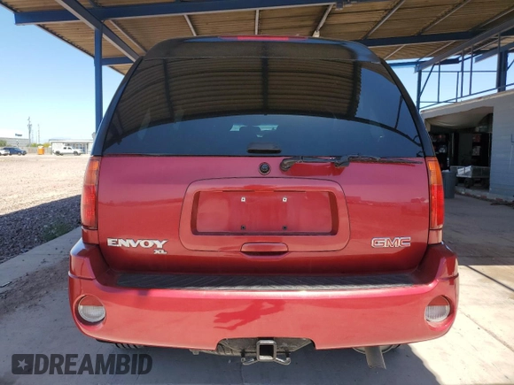 2004 GMC Envoy SLT with VIN 1GKET16S646144154, listed as a Copart auction lot 54154855 with 168,190 mi miles and Clean Title. Bid and sale history available at DreamBid. Image 6.