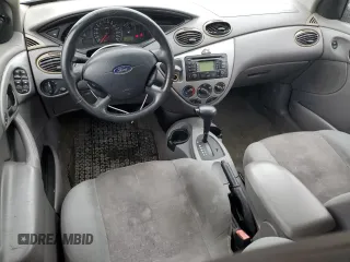 2004 Ford Focus with VIN 3FAFP37Z94R101447, listed as a Copart auction lot 74570054 with 162,166 mi miles and Salvage title. Bid and sale history available at DreamBid. Image 8.
