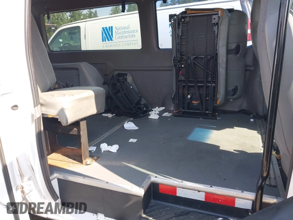 2013 Ford Econoline Cargo Commercial with VIN 1FTNE1EW2DDA78482, listed as a IAAI auction lot 42575152 with 543,296 mi miles and . Bid and sale history available at DreamBid. Image 8.