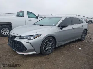 2019 Toyota Avalon XLE with VIN 4T1BZ1FB8KU006035, listed as a IAAI auction lot 41591179 with 111,917 mi miles. Bid and sale history available at carsss.com. Image 2.