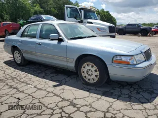 2005 Mercury Grand Marquis GS z VIN 2MEFM74W45X611002, wystawiony jako Copart lot #56645615 z przebiegiem 141 059 mil mil oraz Tytuł czysty. Historia ofert i sprzedaży dostępna na DreamBid. Obrazek 4.