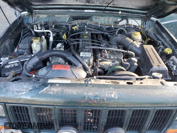 1999 Jeep Cherokee SE with VIN 1J4FF27S9XL667941, listed as a Copart auction lot 42429785 with 121,490 mi miles and Salvage title. Bid and sale history available at DreamBid. Image 12.