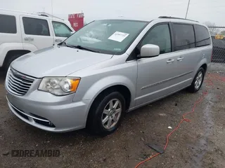 2012 Chrysler Town & Country Touring with VIN 2C4RC1BGXCR213014, listed as a IAAI auction lot 41997723 with 143,848 mi miles. Bid and sale history available at carsss.com. Image 17.