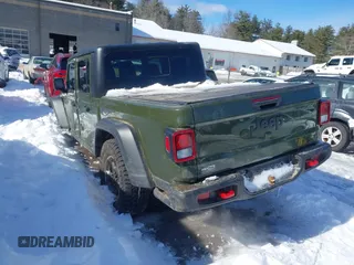 2023 Jeep Gladiator Rubicon with VIN 1C6JJTBG6PL576818, listed as a IAAI auction lot 41515428 with 10,271 mi miles and . Bid and sale history available at DreamBid. Image 3.