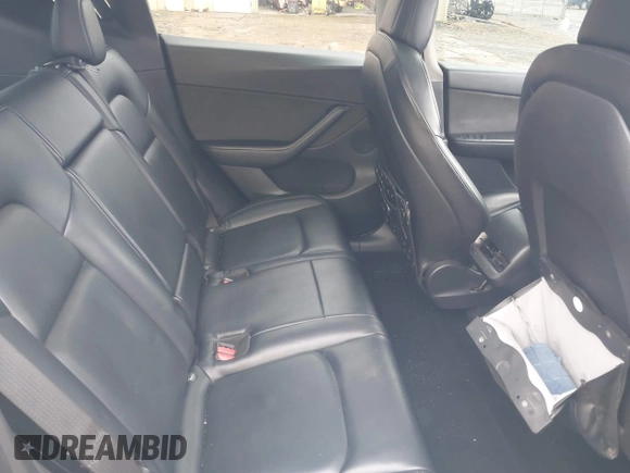 2021 Tesla Model Y Standard Range with VIN 5YJYGDED8MF114076, listed as a IAAI auction lot 41567295 with 150,133 mi miles and . Bid and sale history available at DreamBid. Image 8.