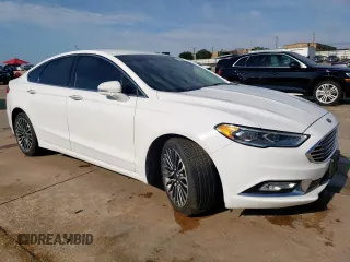 2017 Ford Fusion Titanium с VIN 3FA6P0K99HR118082, выставлен на аукционе Copart как лот 55459615 с пробегом 89 148 миль миль и Чистый • Clean title. История ставок и продаж доступна на DreamBid. Изображение 4.